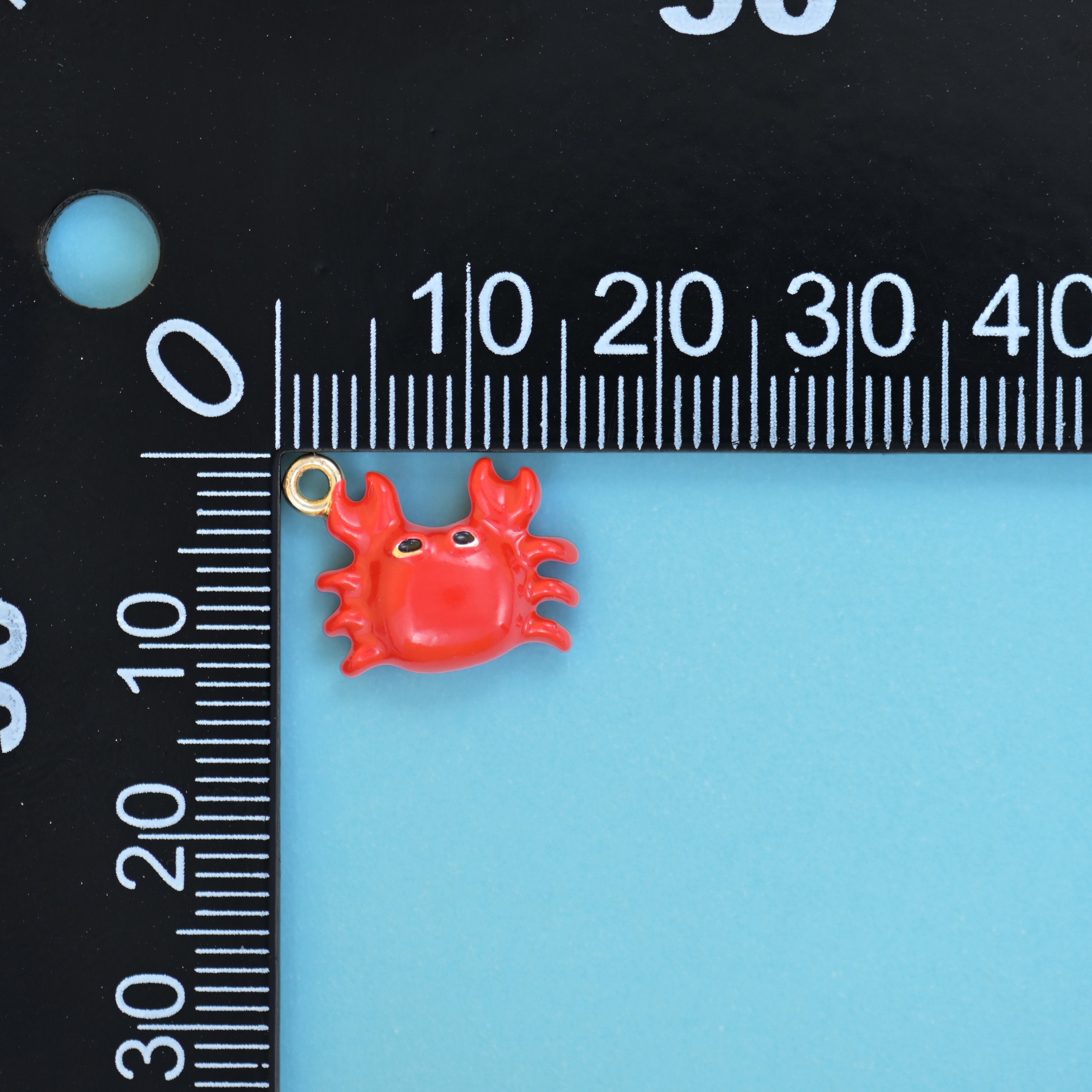 Enamel crab charms, a single red crab charm measured at 13.98 x 11.14mm with its 18K gold plated jump ring