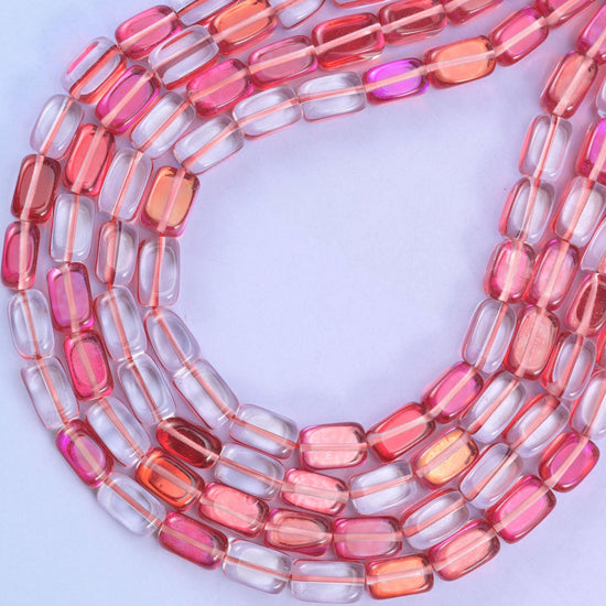 Red Mystic Aura glass beads, approximately 34 beads per strand