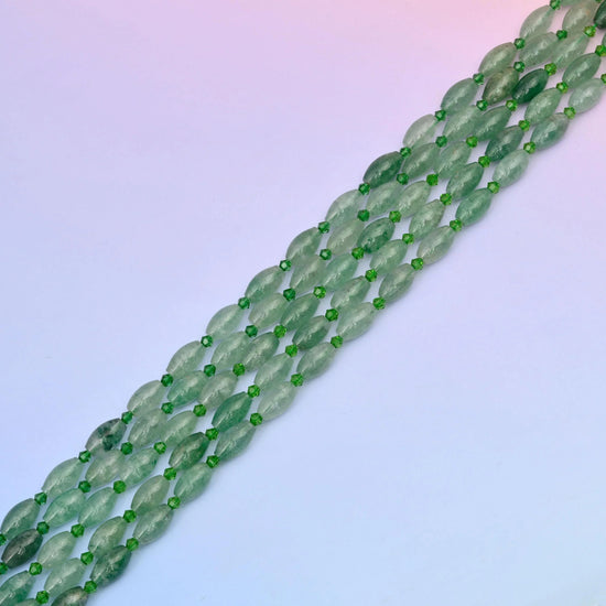 Green strawberry quartz beads in soft leaf green tones