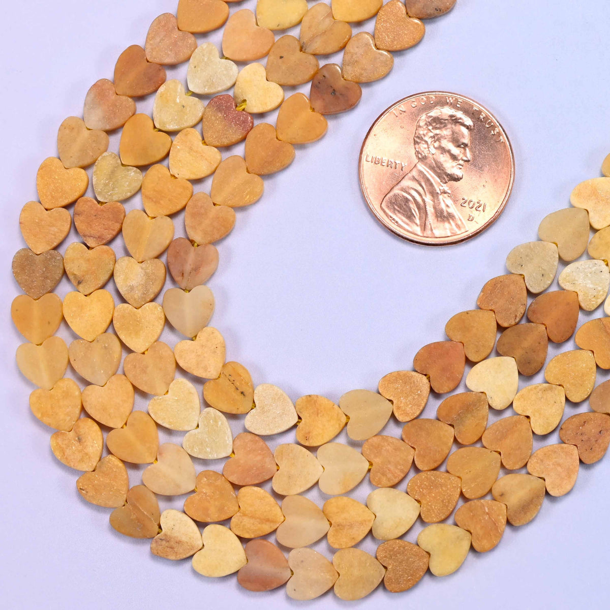 Flat heart cut Gold Silk Jade beads