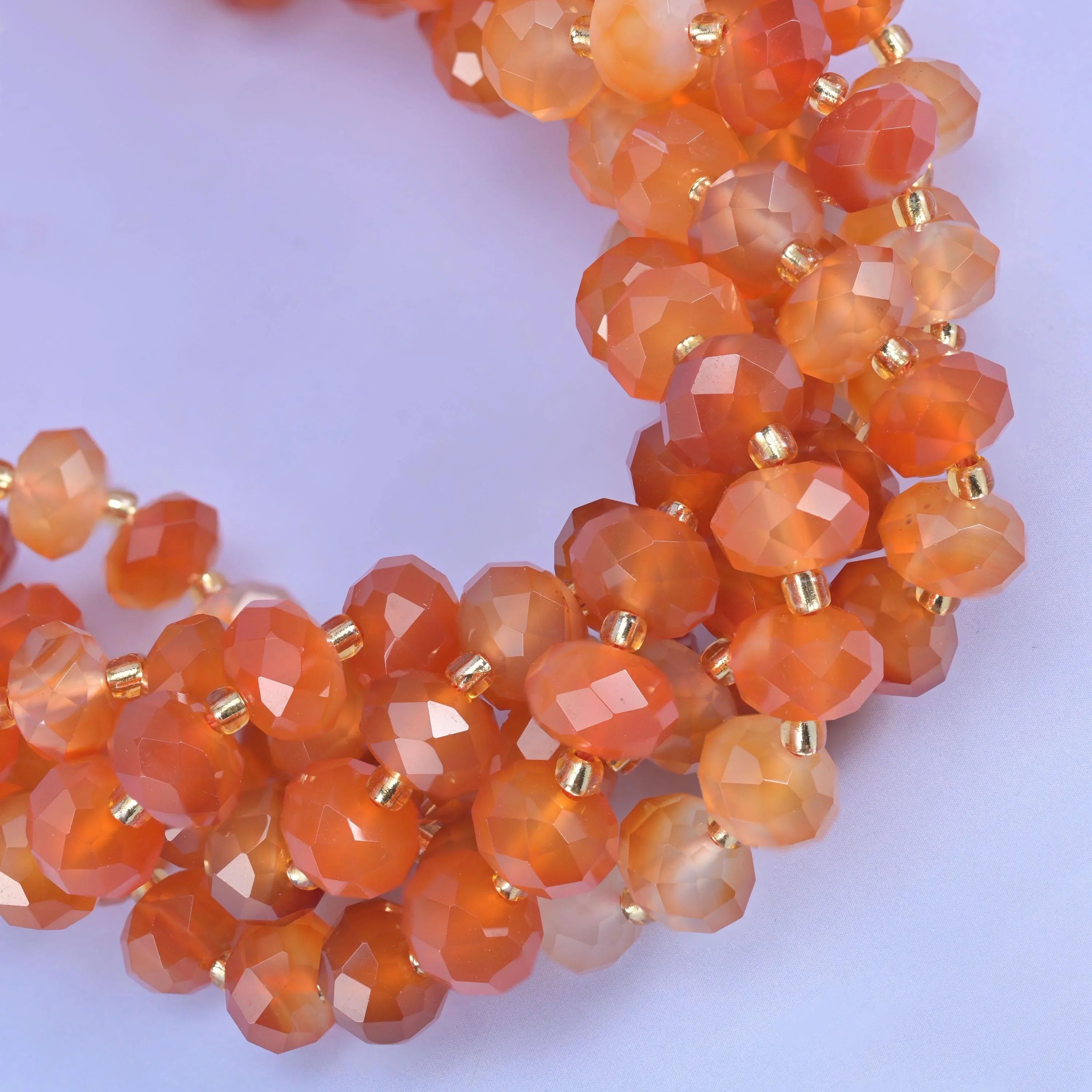 Faceted rondelle cut orange carnelian beads
