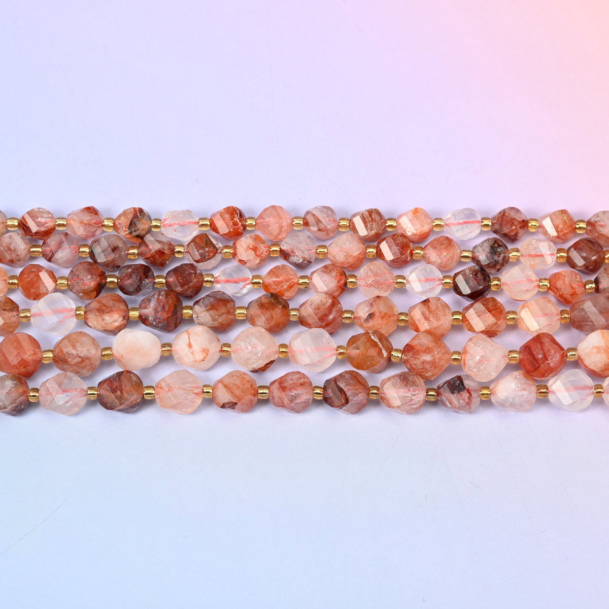 Red Hematoid Quartz in rust and apricot bleeding through milky quartz