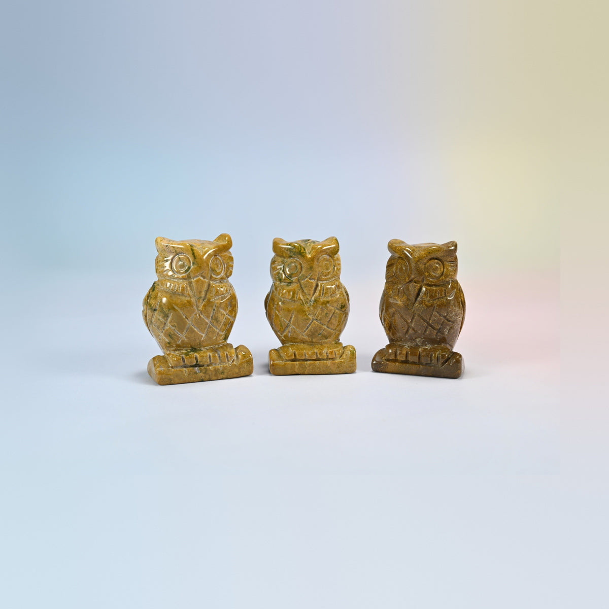 Owl crystal carving in ocean jasper, golden brown and green natural stone