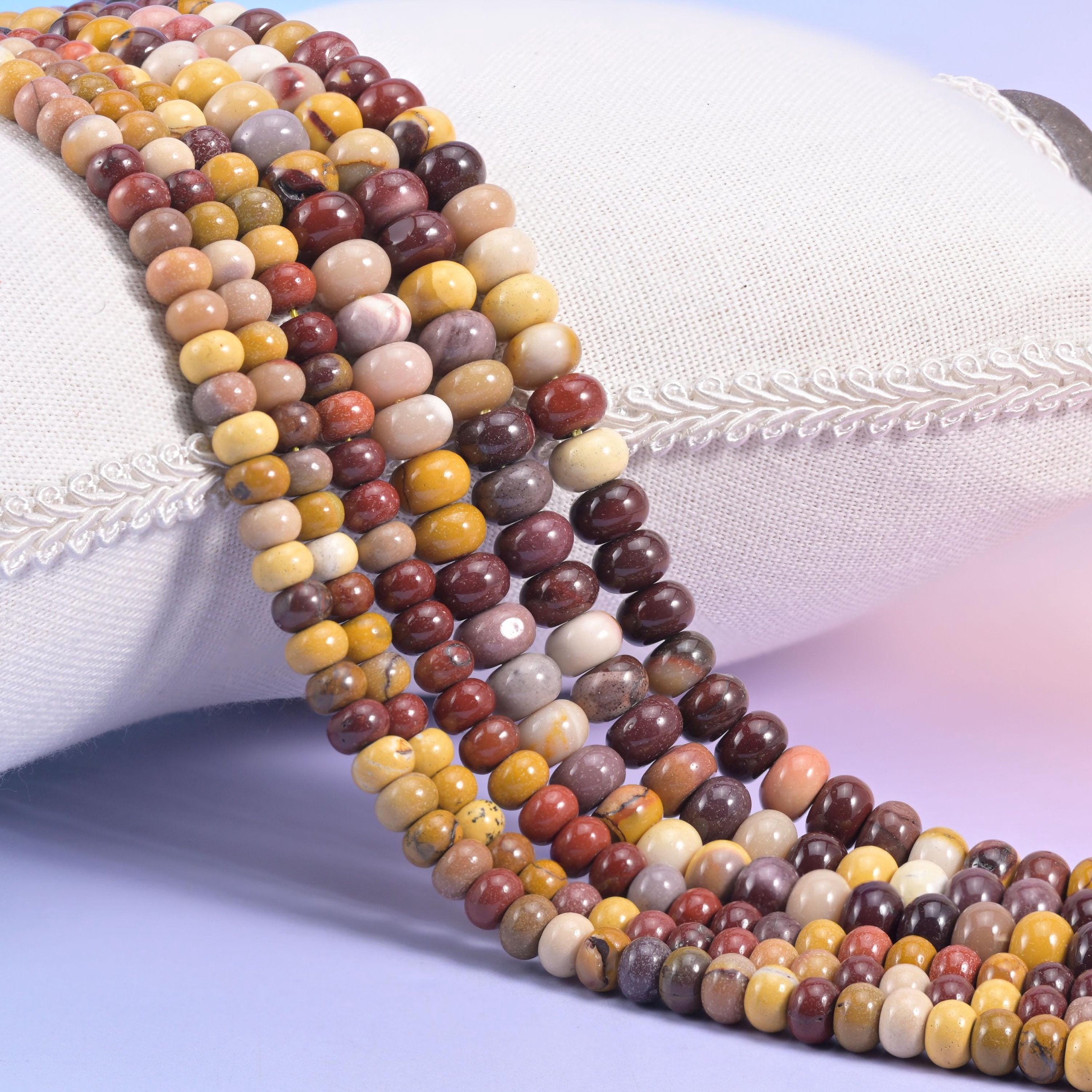 Natural Mookaite Jasper smooth rondelle beads in a warm mix of mustard, burgundy, cream, and rust tones