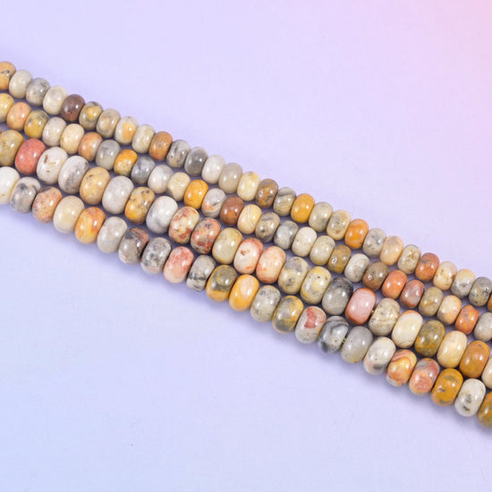 Crazy Lace Agate rondelle beads in amber, cream, gray, and rust tones