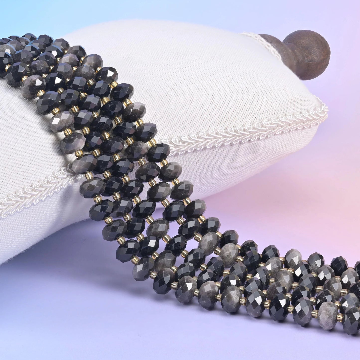 Silver Obsidian faceted rondelle beads in smoky grey-black with a silvery sheen