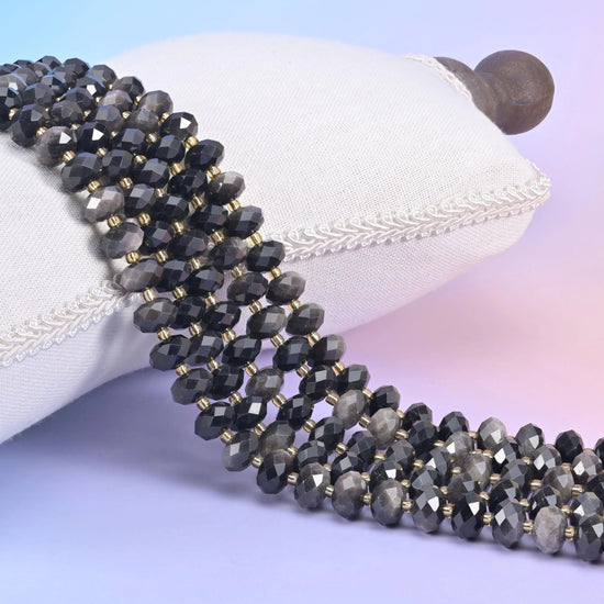 Silver Obsidian faceted rondelle beads in smoky grey-black with a silvery sheen