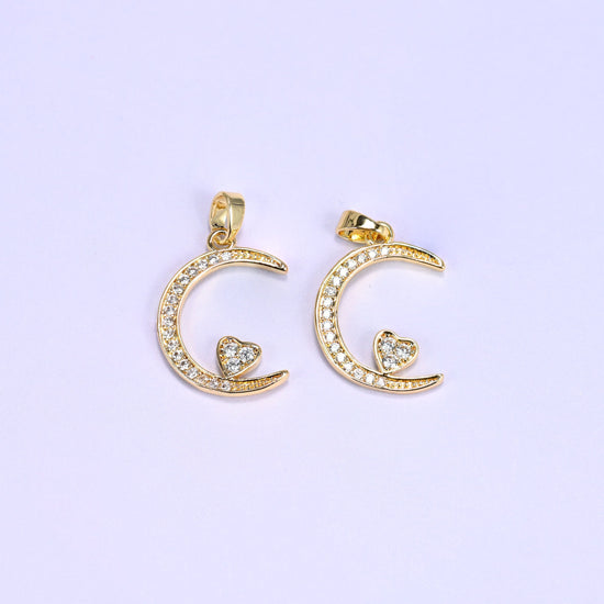 Crescent moon charm with a heart accent nestled in clear zircon pave