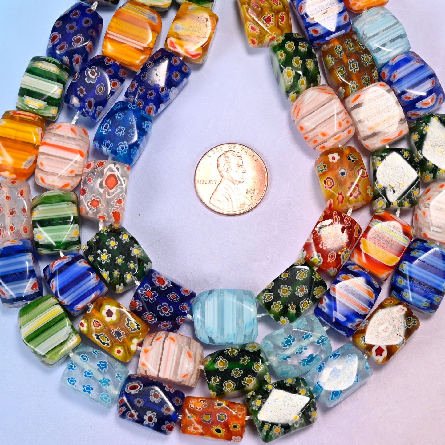 Millefiori glass beads, drill hole approximately 1.0mm.