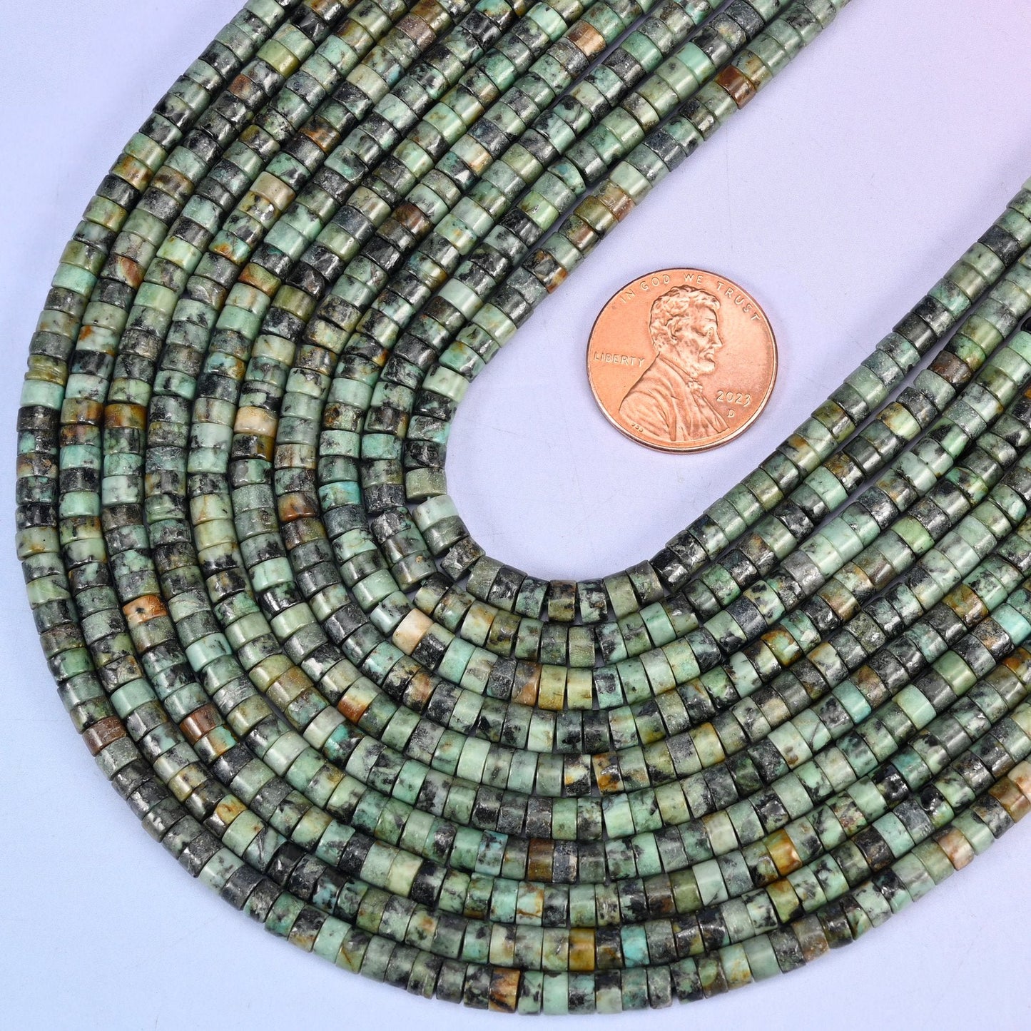 Smooth heishi disc cut African Howlite beads