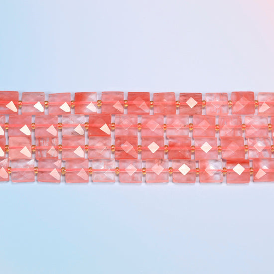 Several strands of melon quartz faceted flat square beads laid in straight rows
