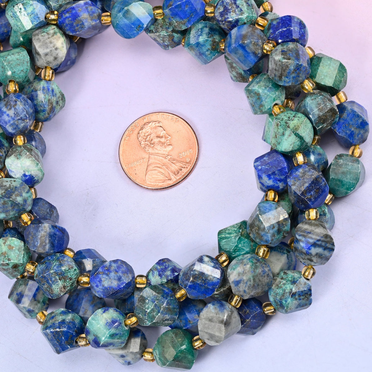 Phoenix Lapis lapis lazuli beads, 10mm spiral twist beads with colour variation from bead to bead