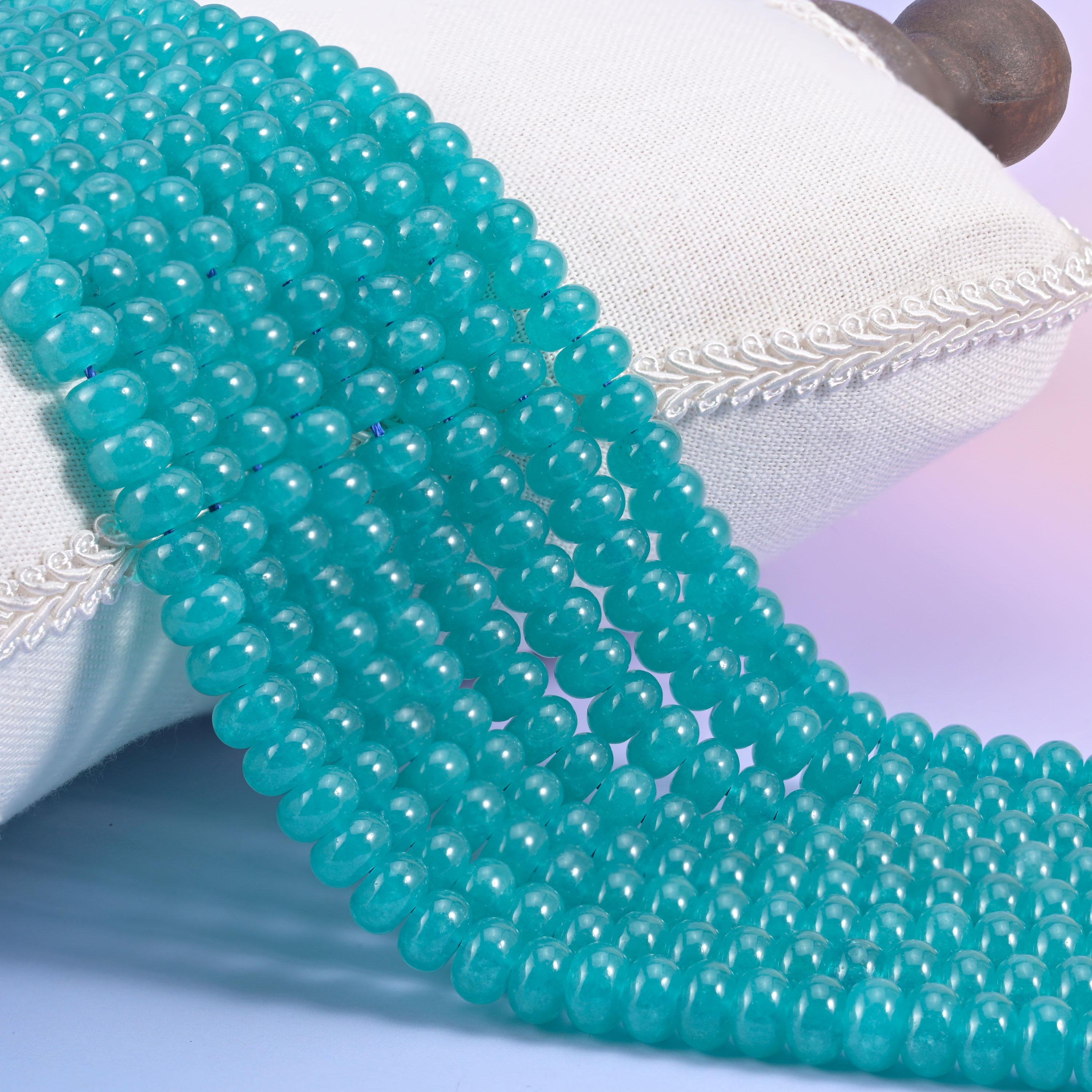 Teal Dyed Jade smooth rondelle beads in a rich aqua-teal hue