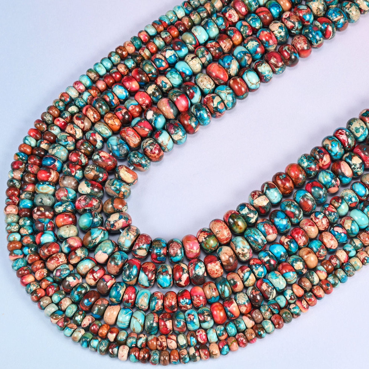 Red Dyed Sea Sediment Jasper Rondelle Beads, sold per 15 inch strand.