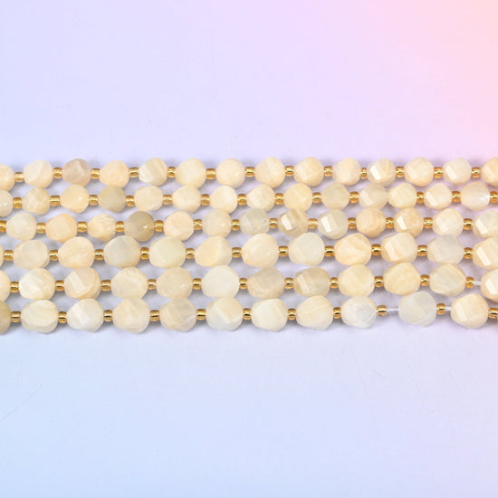 White Moonstone beads in creamy ivory and pale champagne with a soft inner glow