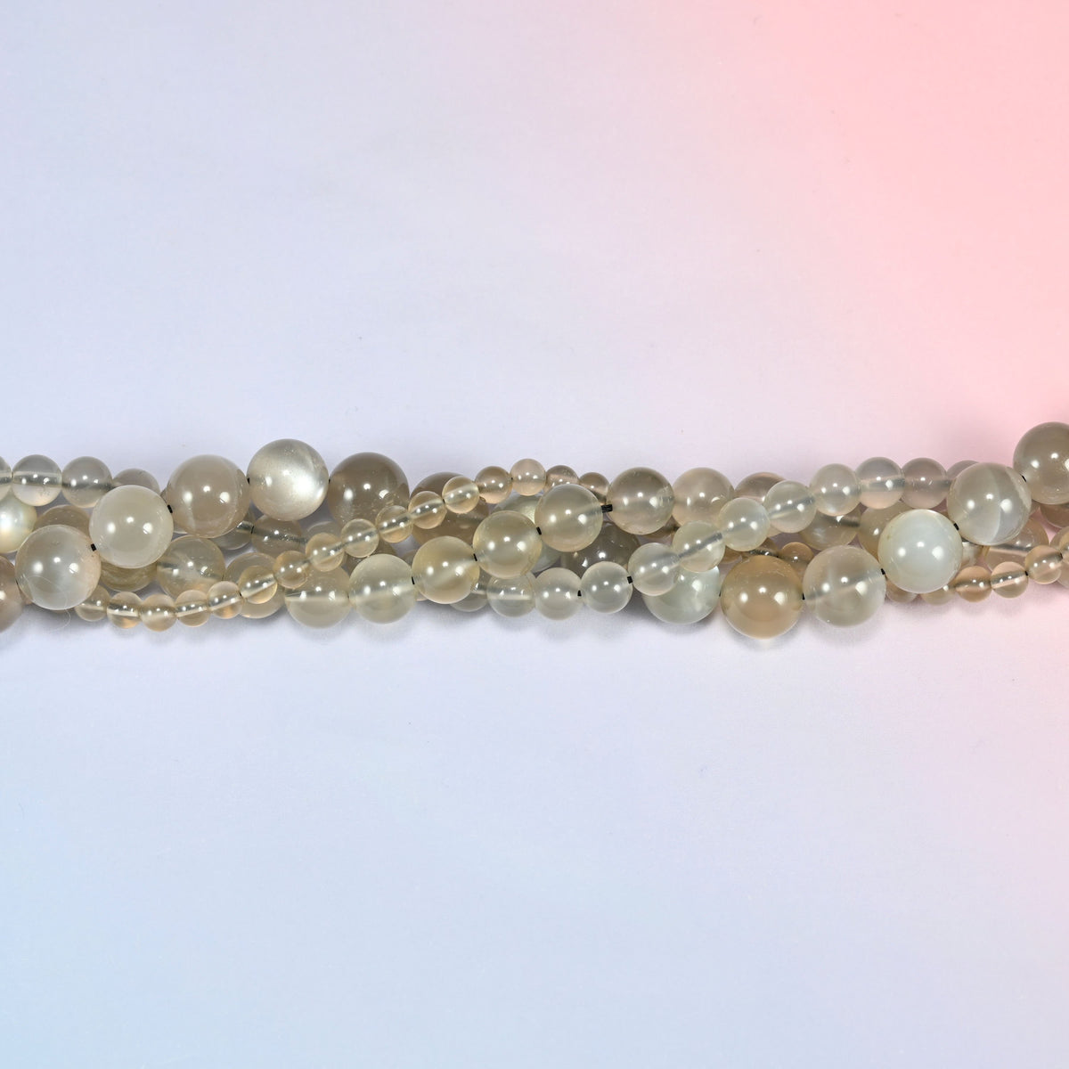 AAA Gray Labradorite smooth round beads in a single close run, polished smooth with no faceting