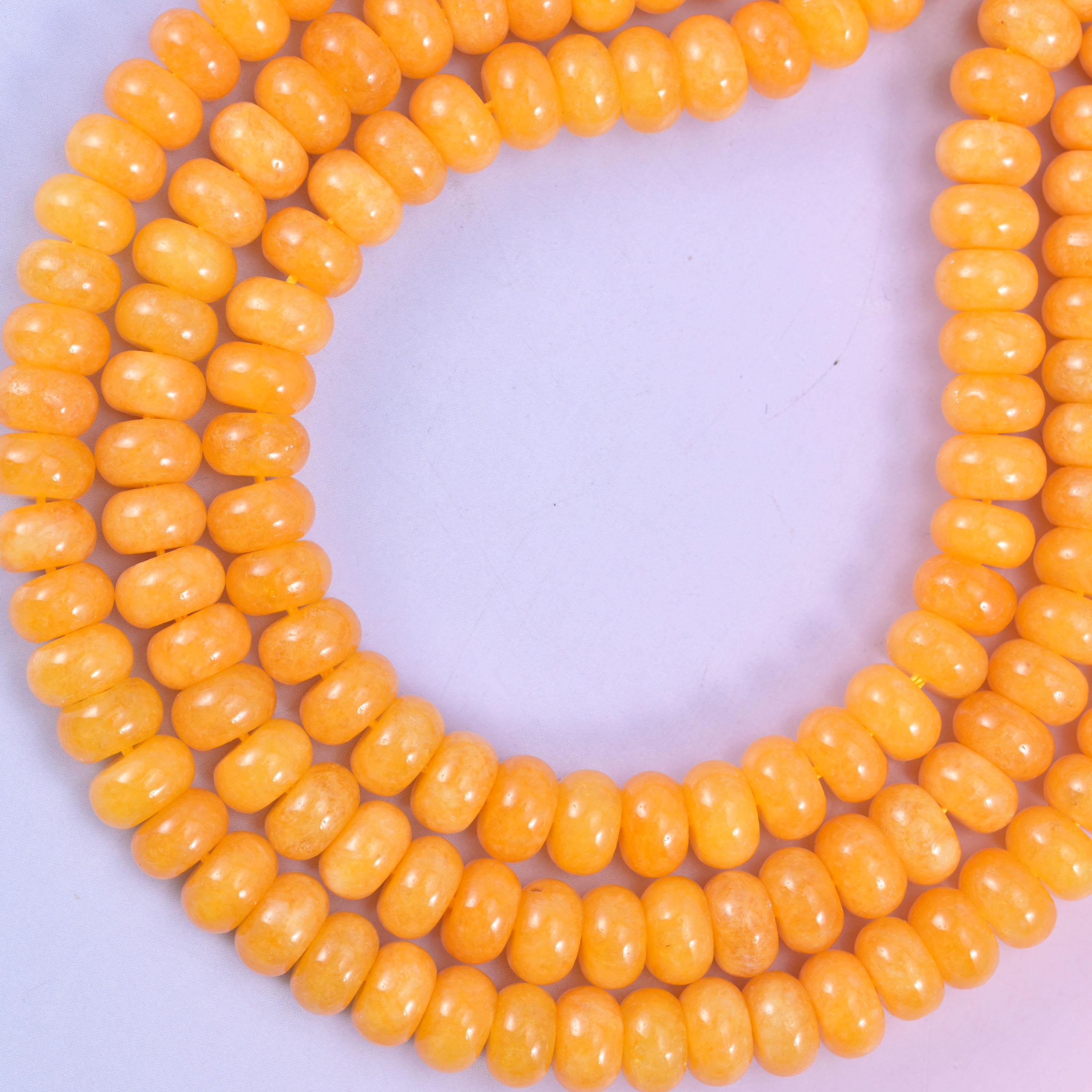 Orange Dyed Jade rondelle beads, approximately 75 beads per strand