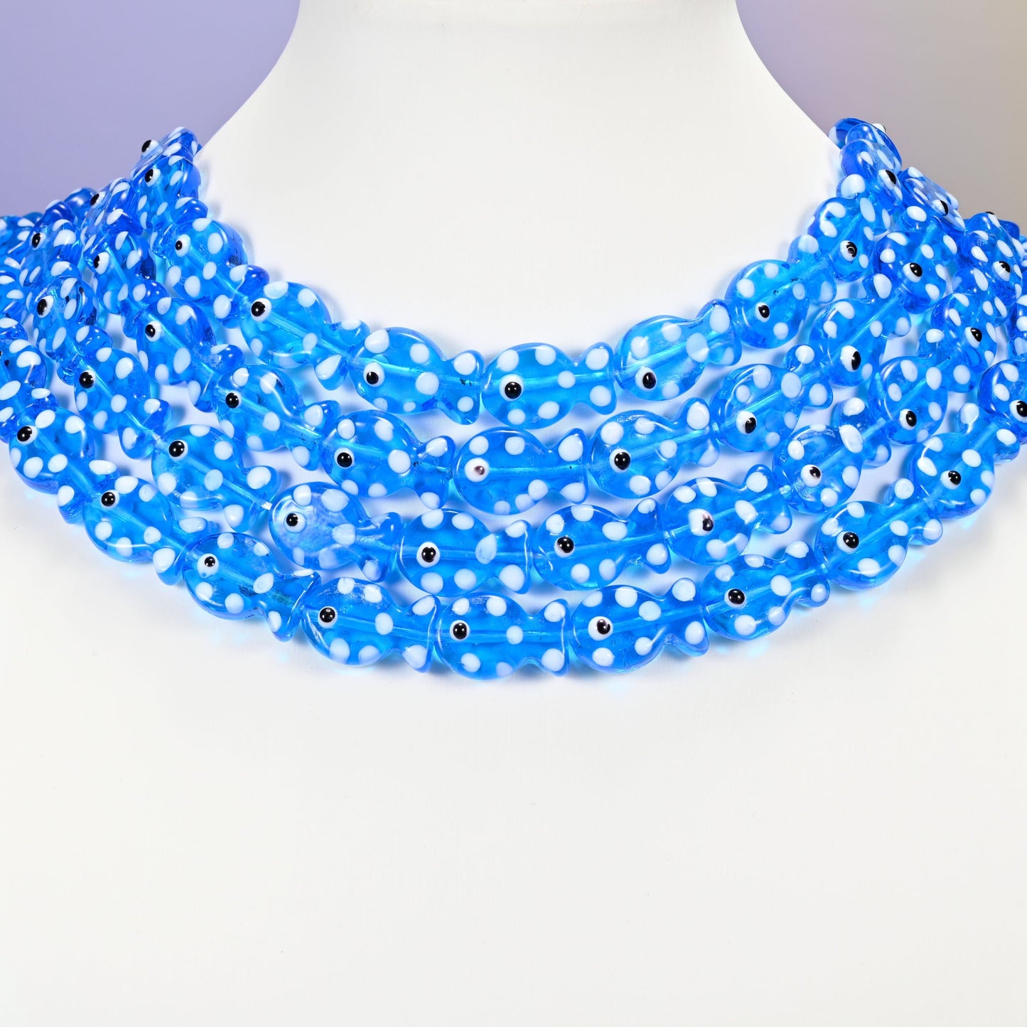 Fish glass beads, transparent blue with white dots, 19x12mm