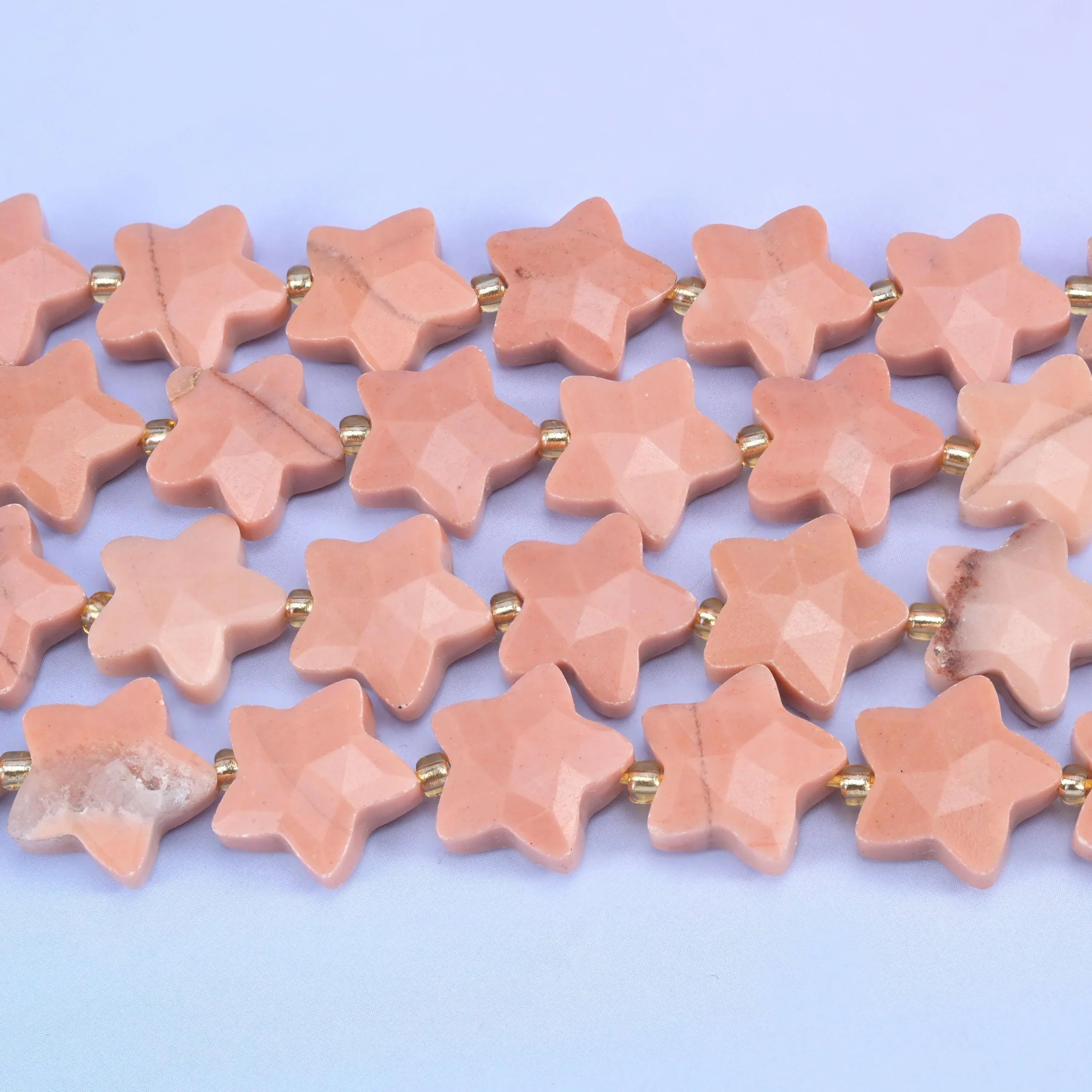 Faceted star cut red aventurine beads