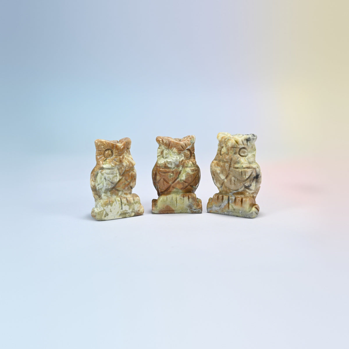 Owl crystal carving in amazonite, tan and cream natural stone