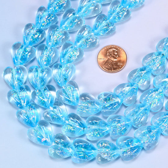 Iridescent light blue heart glass beads shown at actual size, 16x15mm hearts for bracelets and necklaces