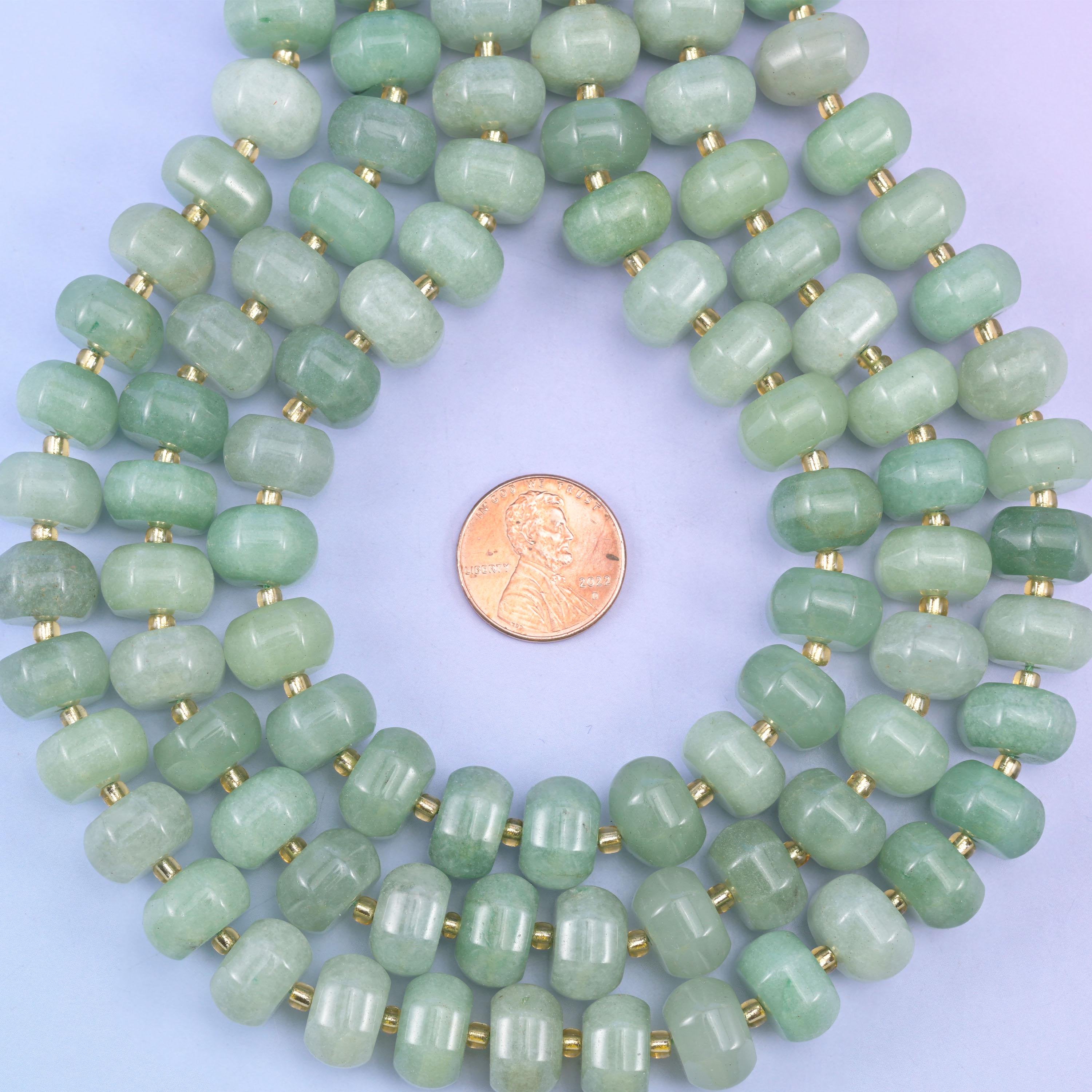 Green aventurine smooth pumpkin beads in soft mint-to-forest green tones with a gentle sparkle