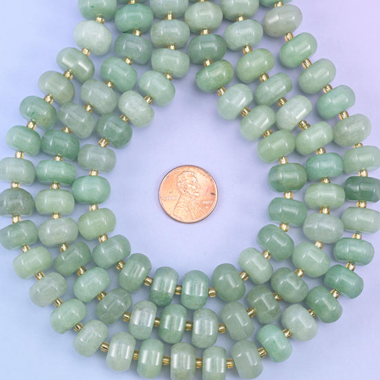Green aventurine smooth pumpkin beads in soft mint-to-forest green tones with a gentle sparkle