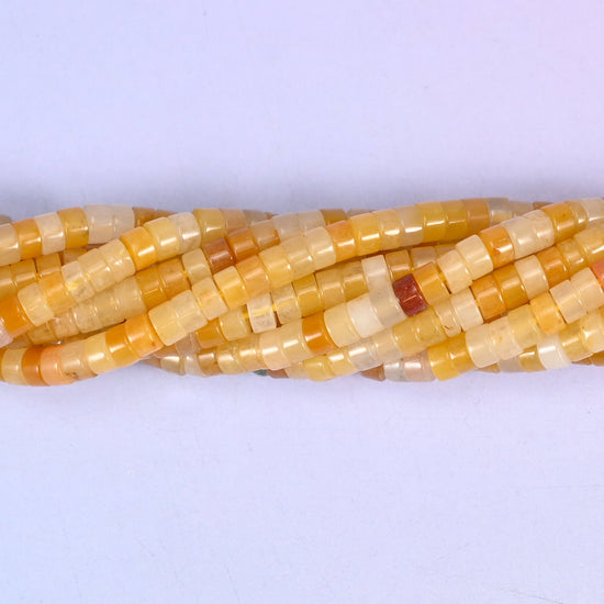 Yellow Jade Smooth Heishi Disc Beads, approximately 180 beads per strand