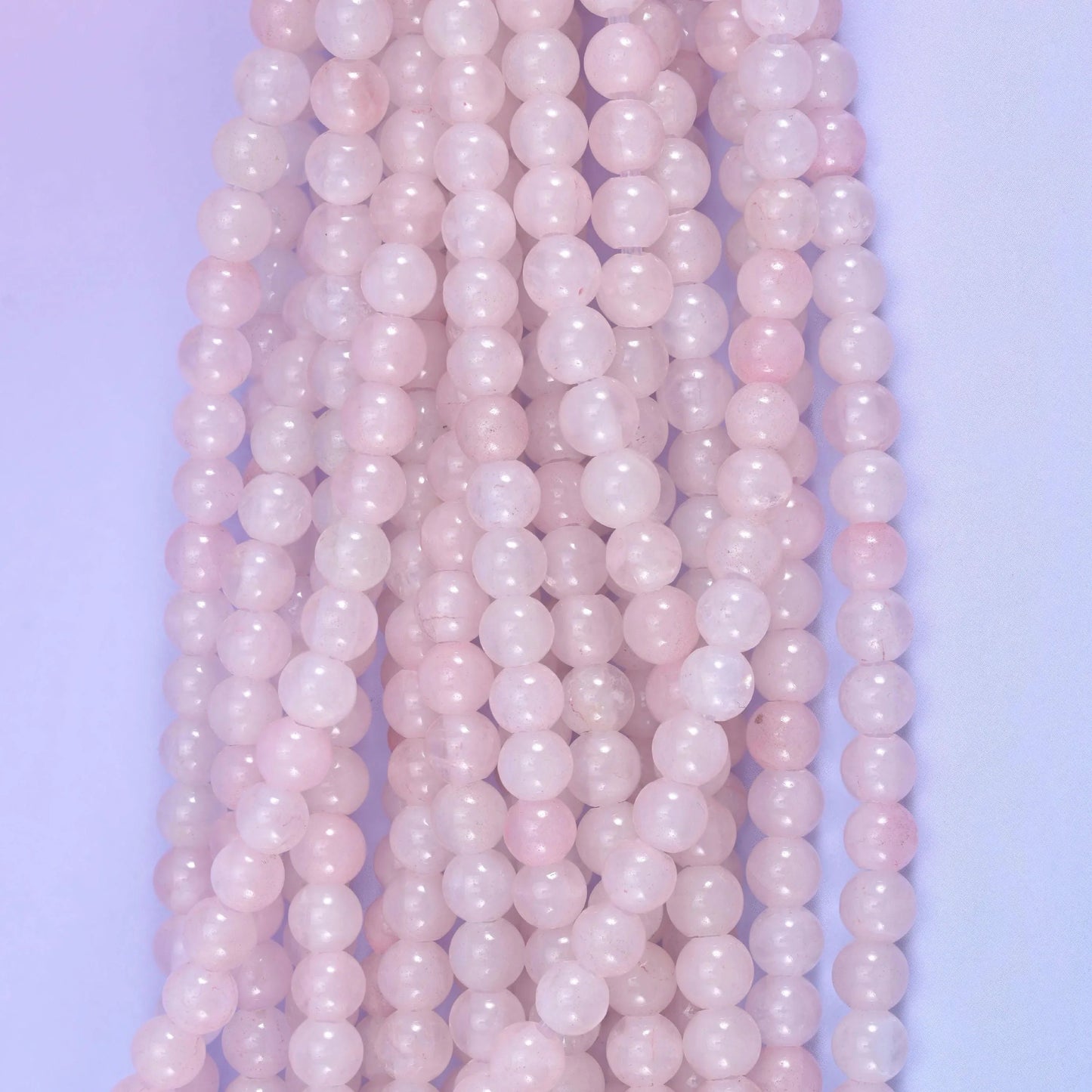 Rose Quartz smooth round beads, 8 inch half strand