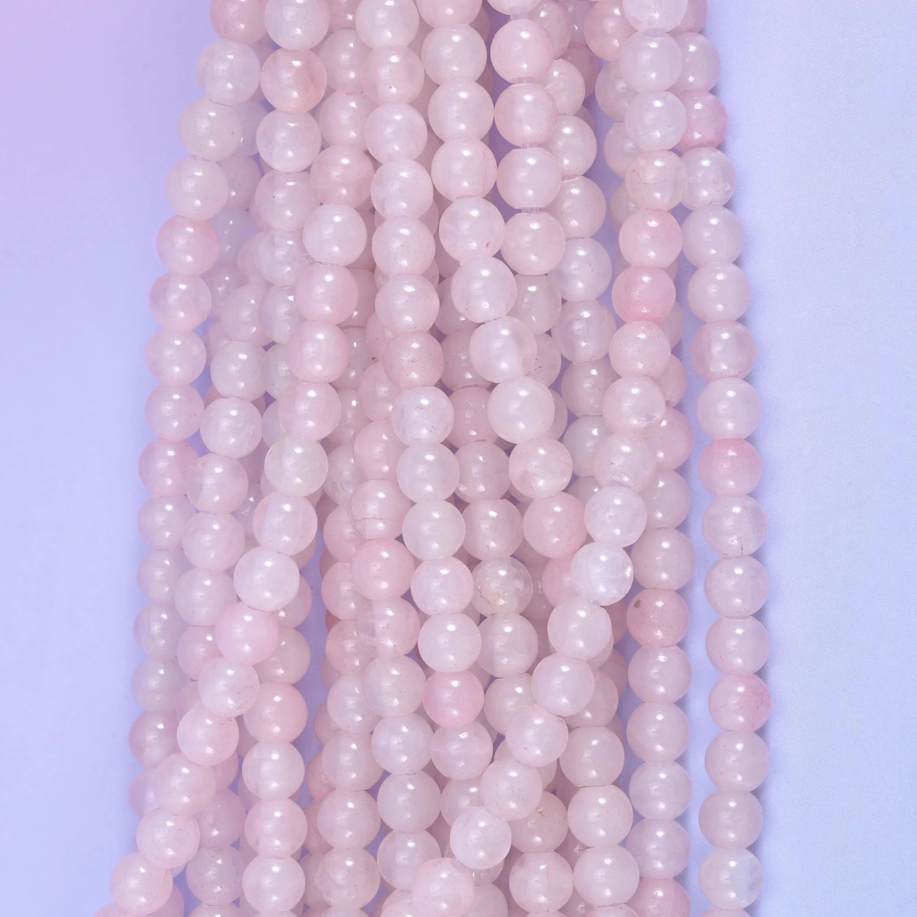 Rose Quartz smooth round beads, 8 inch half strand