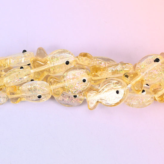 Iridescent Yellow Fish Glass Beads, 20 pieces per strand