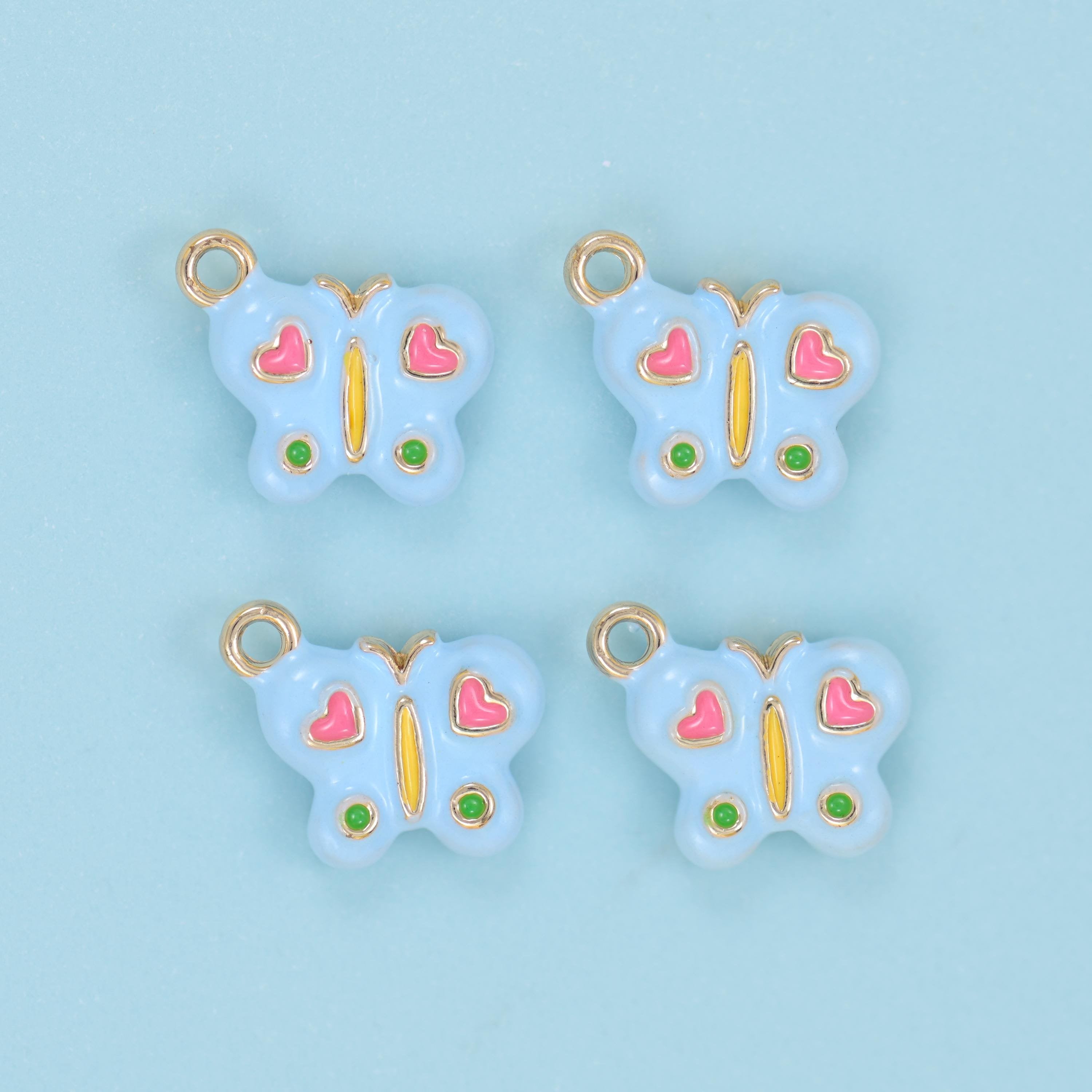 Enamel Colorful Butterfly Charm 14x13mm in sky blue with a slim gold body