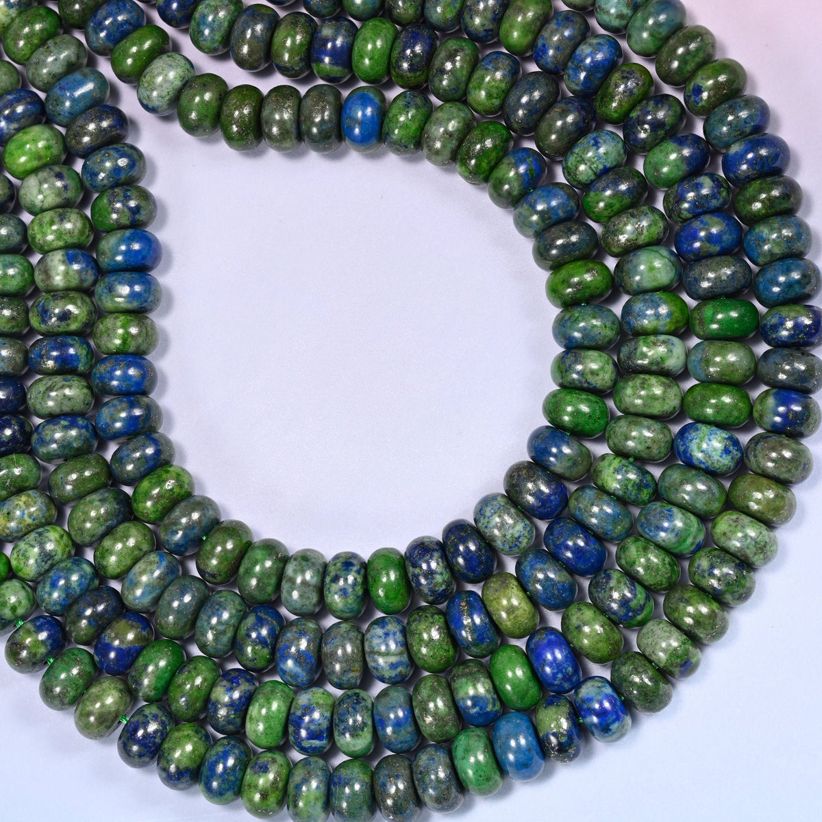 Natural Phoenix Lapis Rondelle Beads with a large 2.5mm centrally drilled hole.