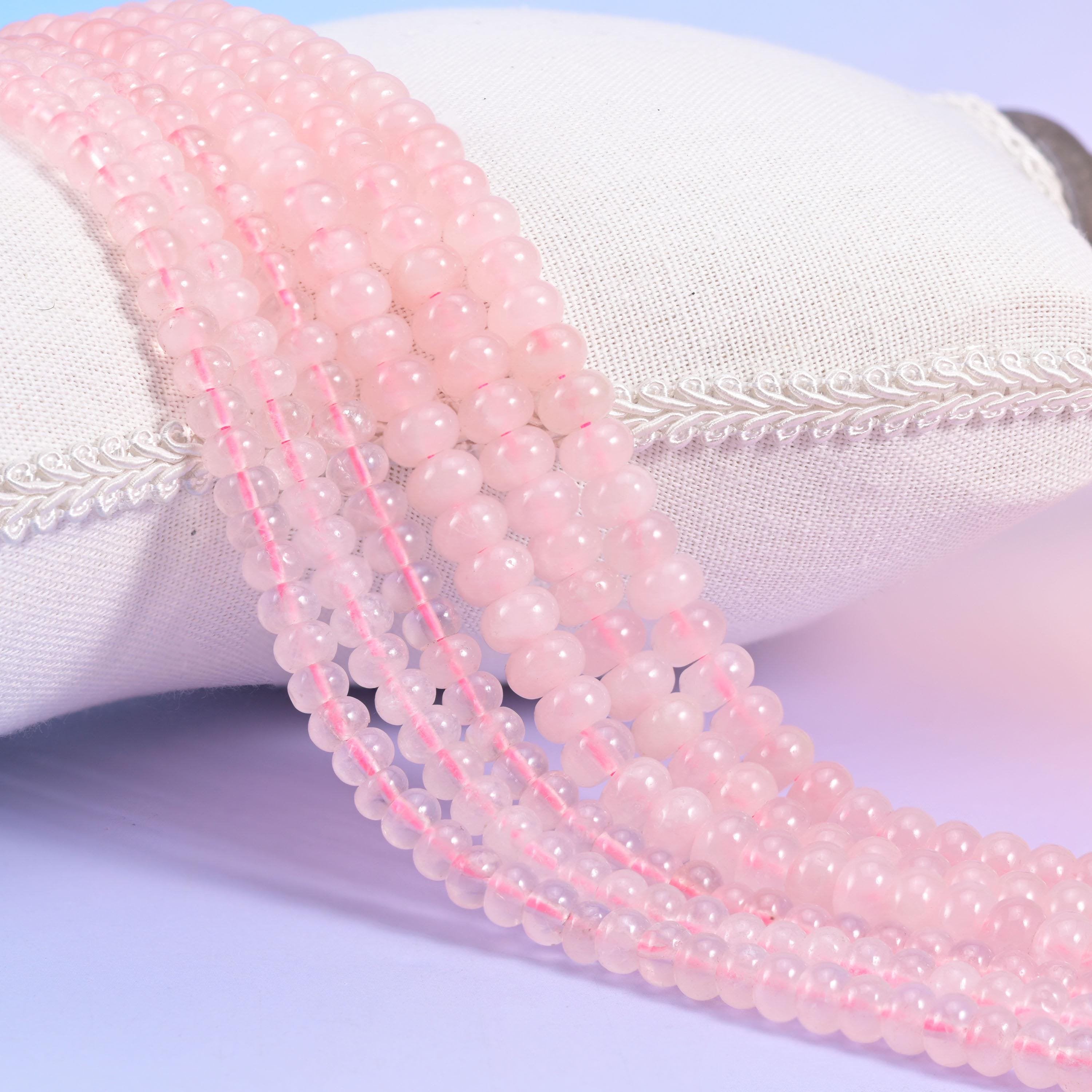 Natural Rose Quartz smooth rondelle beads in soft blush pink with a gentle translucent glow