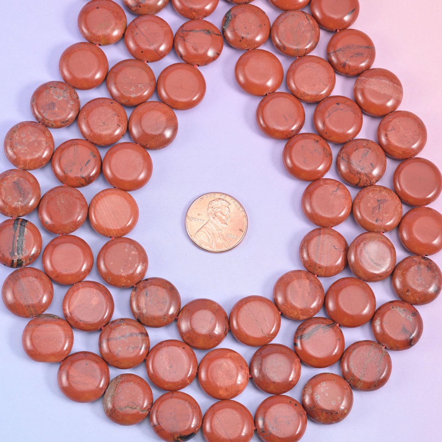 Red Jasper coin beads, approximately 26 beads per strand