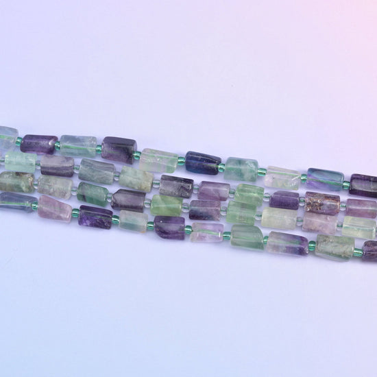 Multi-Color Fluorite beads in pastel to vibrant color combinations.