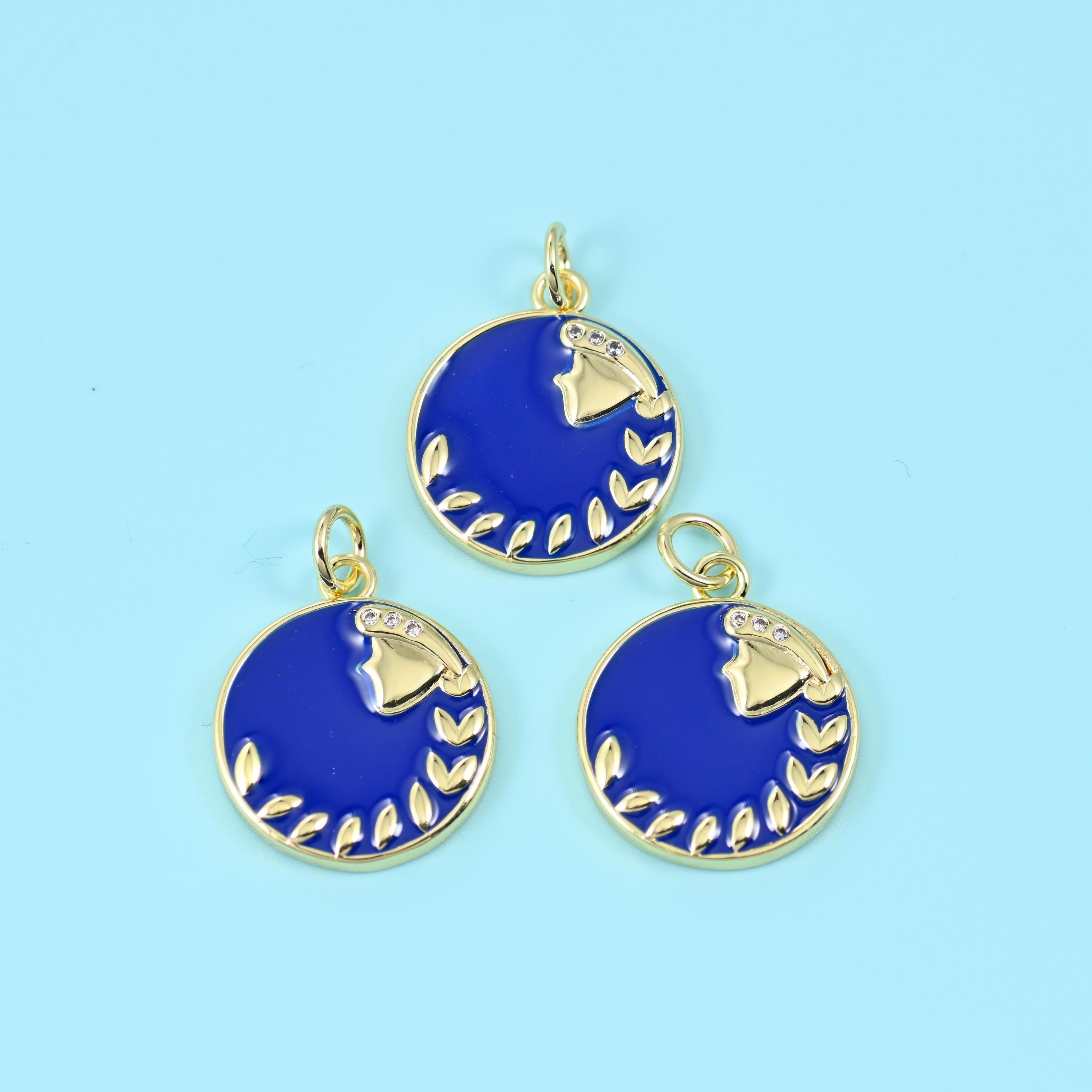 A small round enamel disc with the zodiac figure picked out in gold and set with fine zircon along the glyph. The colour…