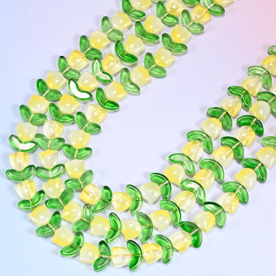 Yellow Tulip Flower Glass Beads with Leaf, 15 inch strand, 27 sets.