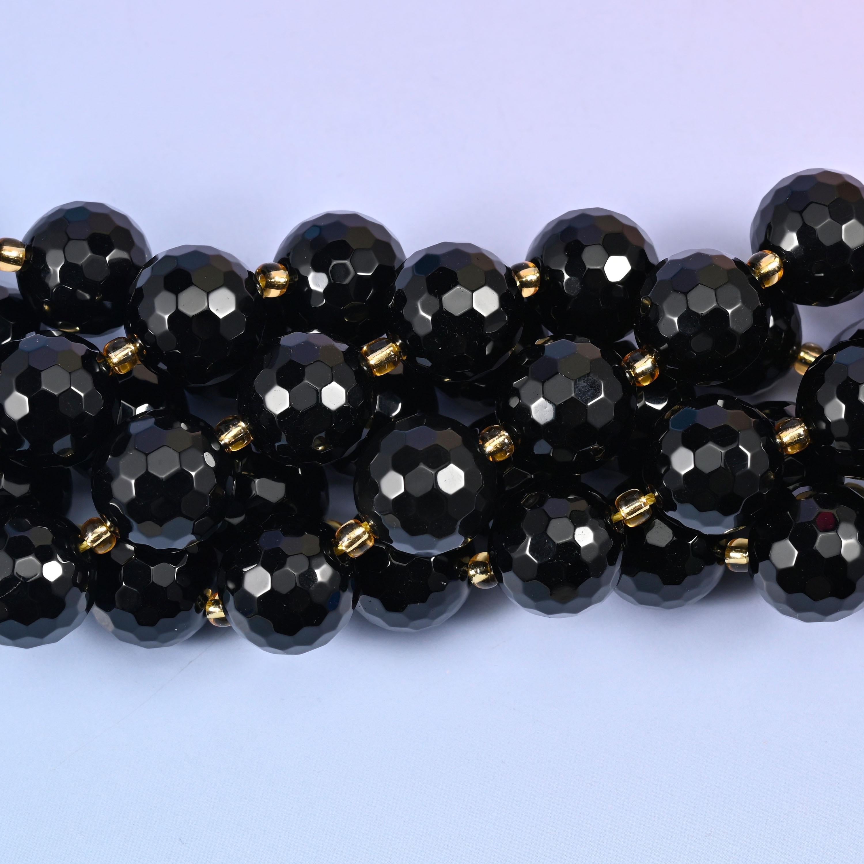 Faceted round cut black onyx beads