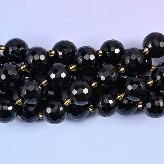Faceted round cut black onyx beads