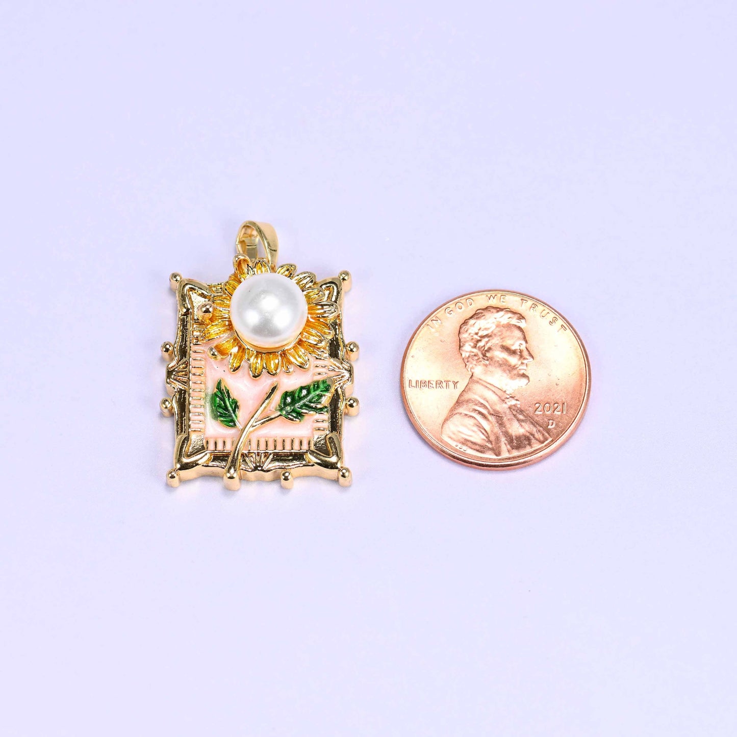 Ornate rectangular frame cut sunflower charm pendant