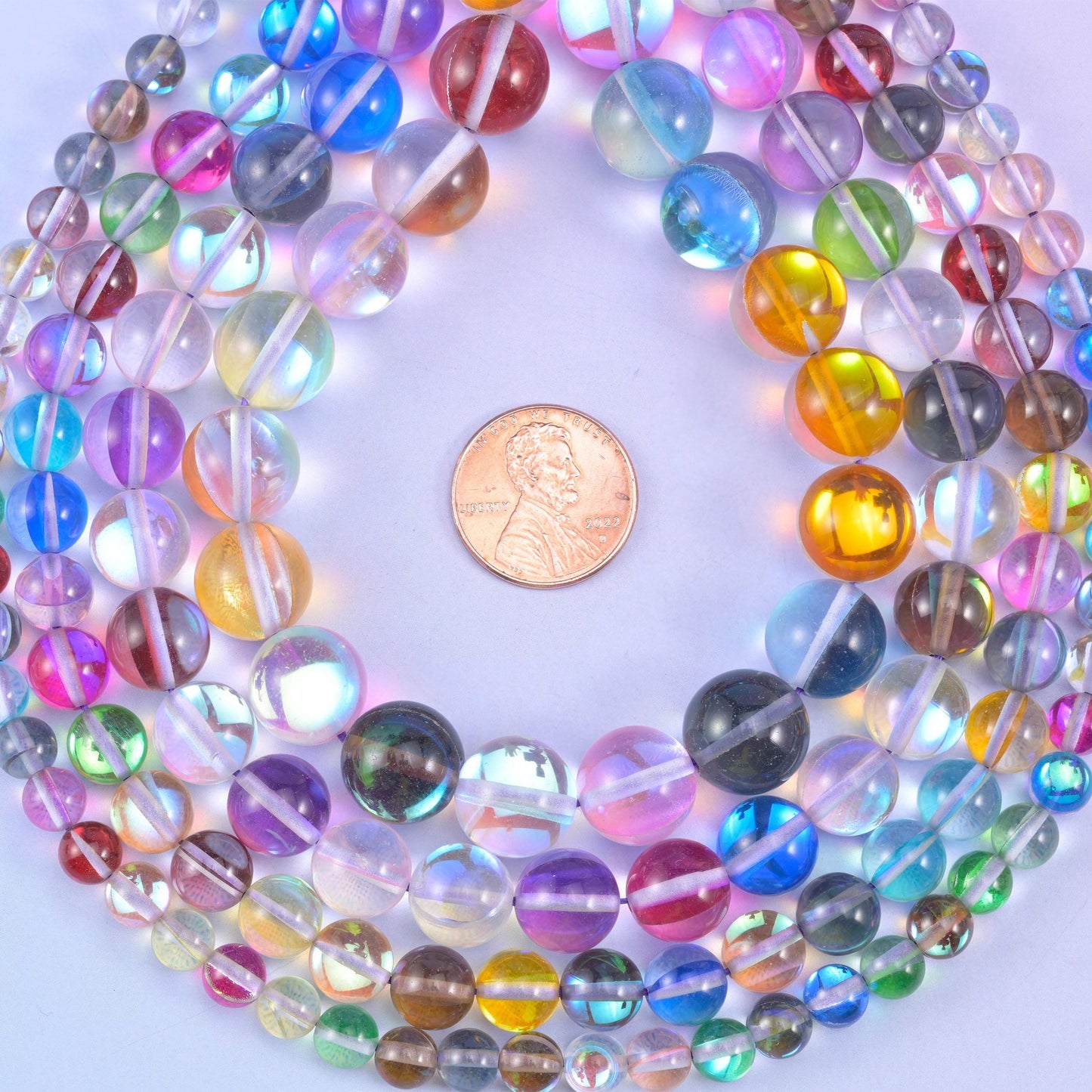 Iridescent rainbow round glass beads, glossy semi-transparent rounds with a rainbow shimmer