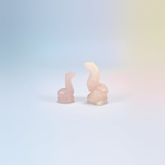 Cobra snake crystal carving in rose quartz, light pink natural stone