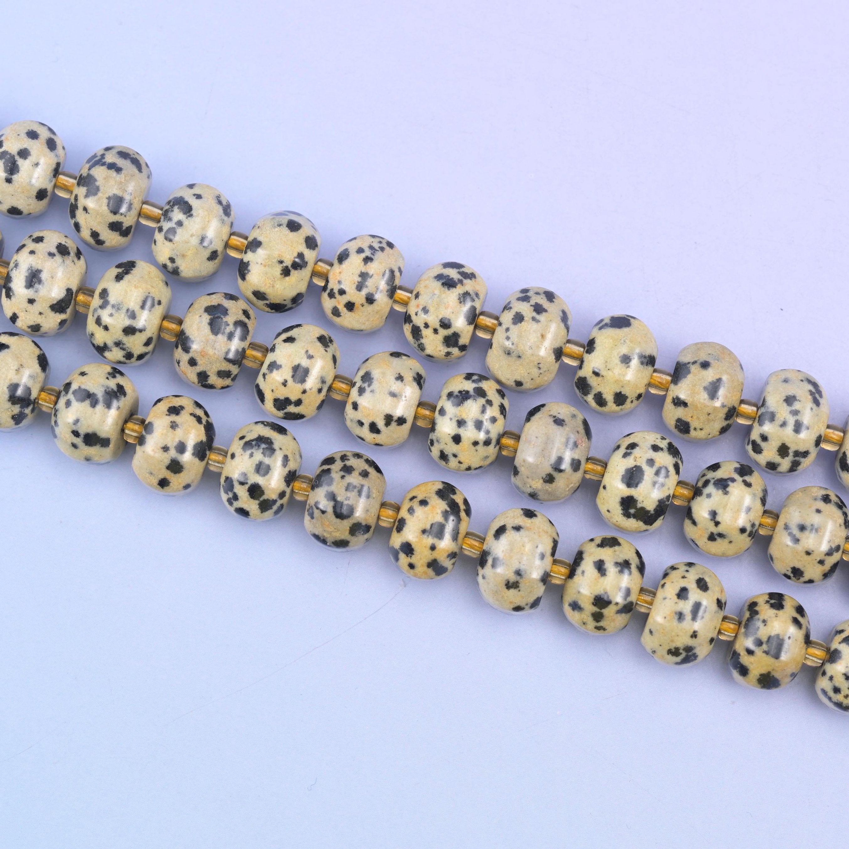 Dalmatian jasper beads in cream and beige with black spots