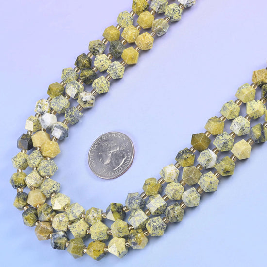 Yellow Howlite faceted rhombus beads, 15.5 inch strand