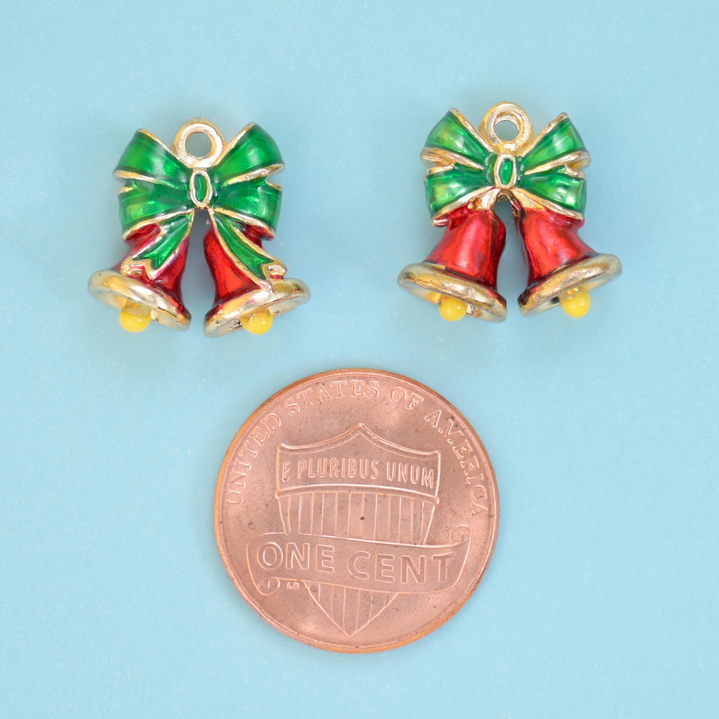 Christmas bell pair with a bow cut brass beads