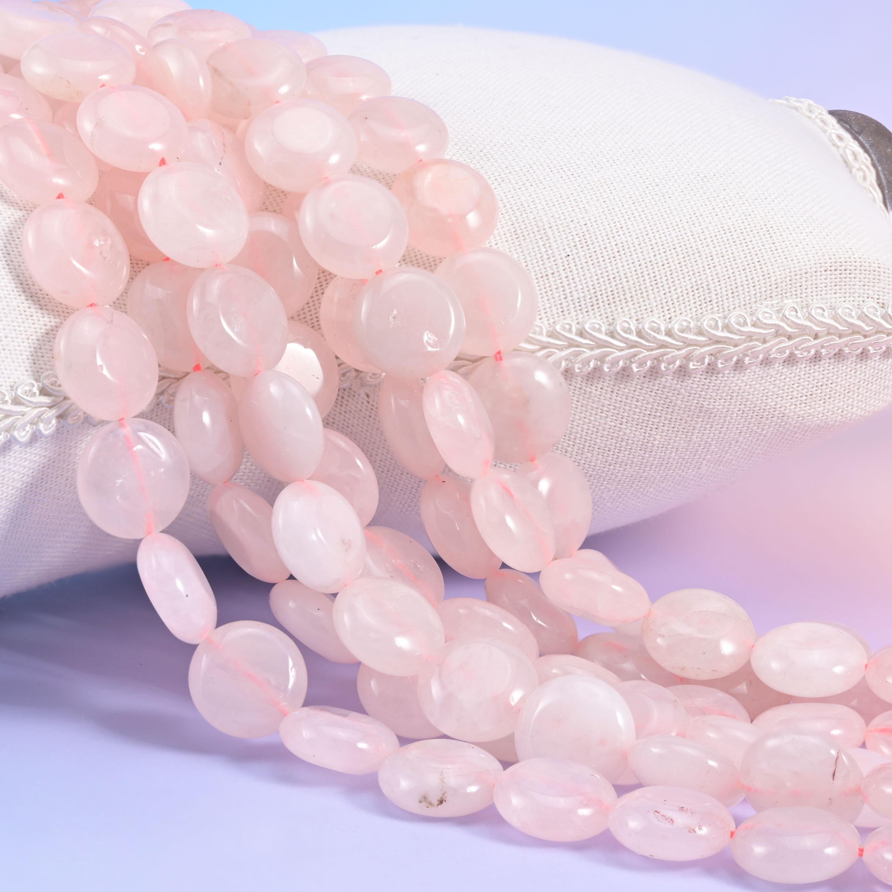Natural Rose Quartz smooth coin beads in pale blush pink with a milky translucent body