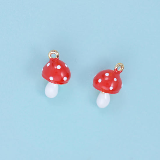 Enamel Mushroom Charm 14x9mm in tomato red with white dots and an ivory white stem