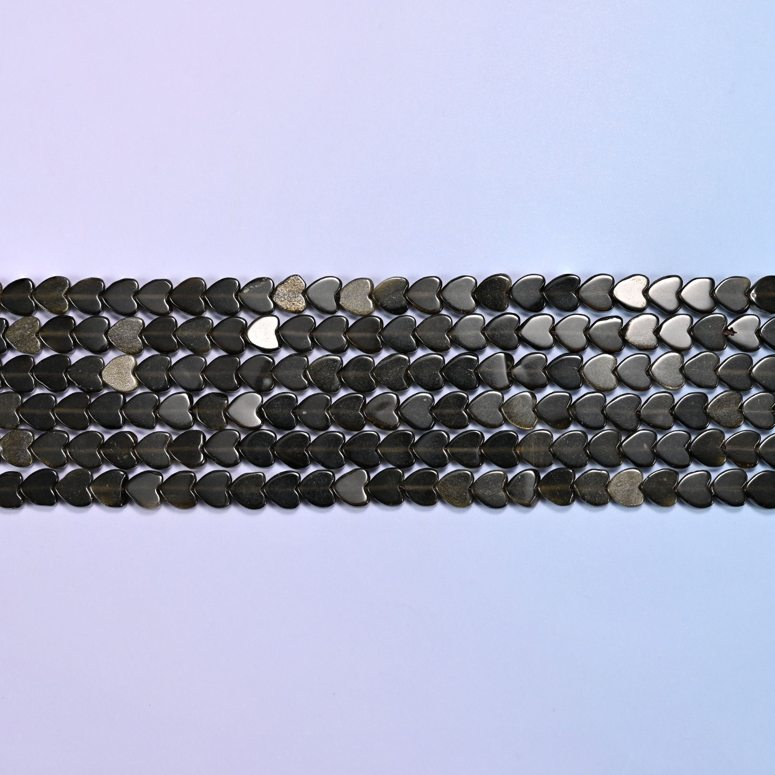 Gold Obsidian Flat Heart Beads in glossy black with a bronze sheen