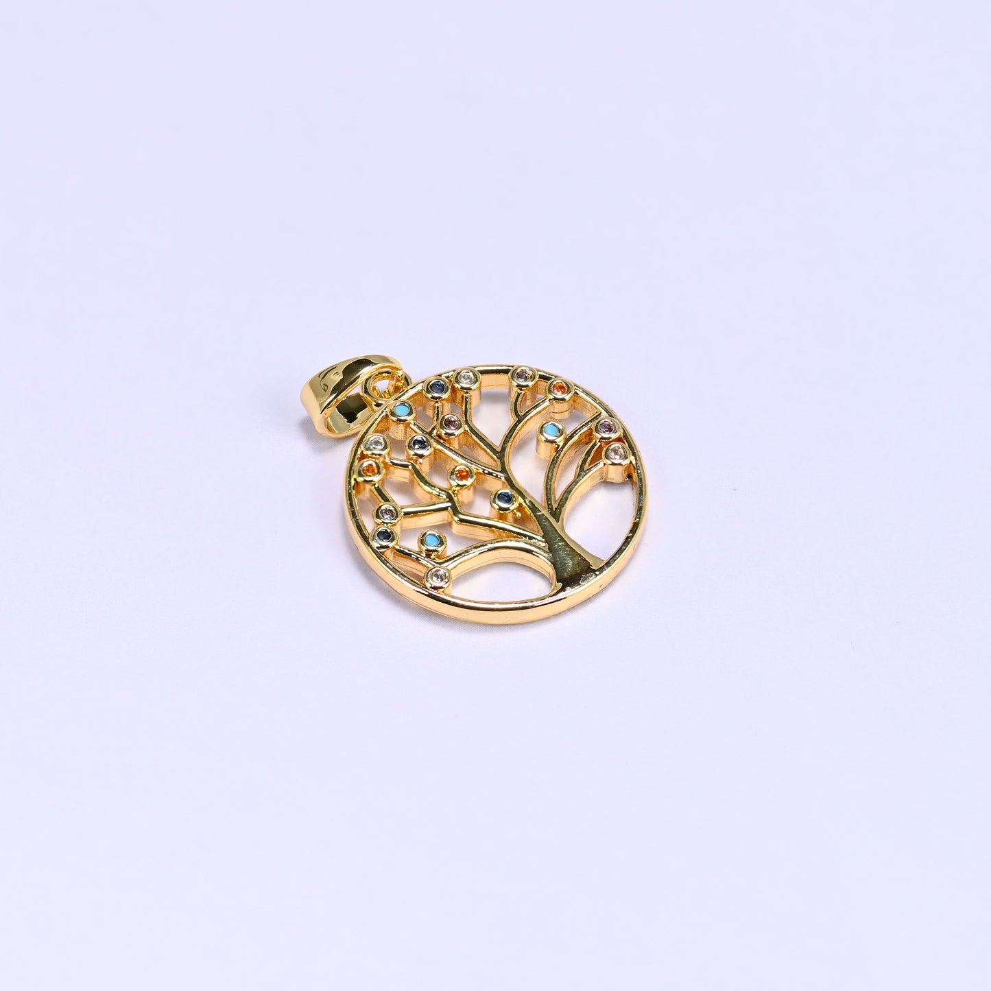 Tree of life charm dotted with multicolor zircon and enamel accents